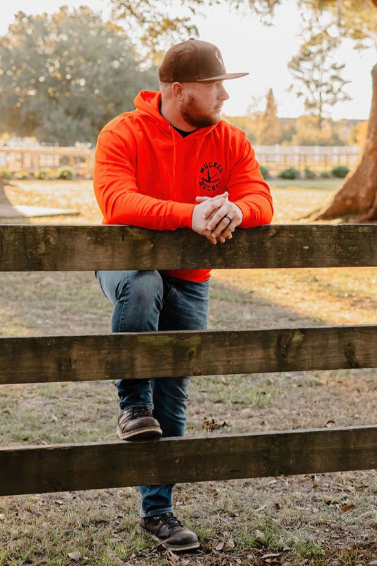 mucker bucket - monster buck hunter orange premium hoodie front on model