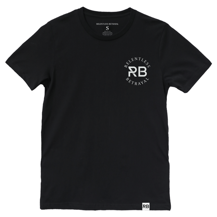 The Never Die Easy Black Tee by Relentless Betrayal is made from fine jersey cotton. It features the white Relentless Betrayal logo and bold RB initials on the front, with a size small tag inside the collar, offering a soft and stylish fit for any unisex wardrobe.