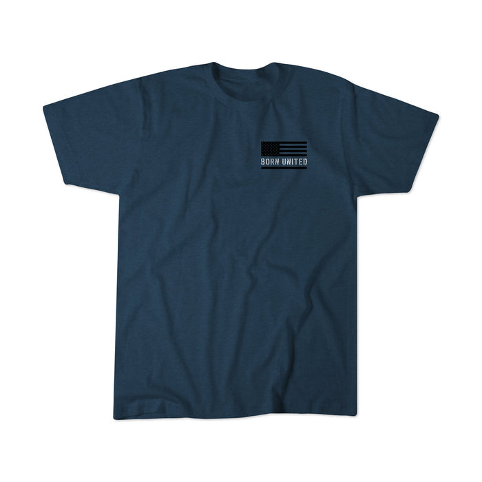 A Dark Heather Blue Saints and Sinners - Zero Dark Edition tee by Born United Private Label, with a small black-and-white American flag and BORN UNITED on the left chest, laid flat on a white background.