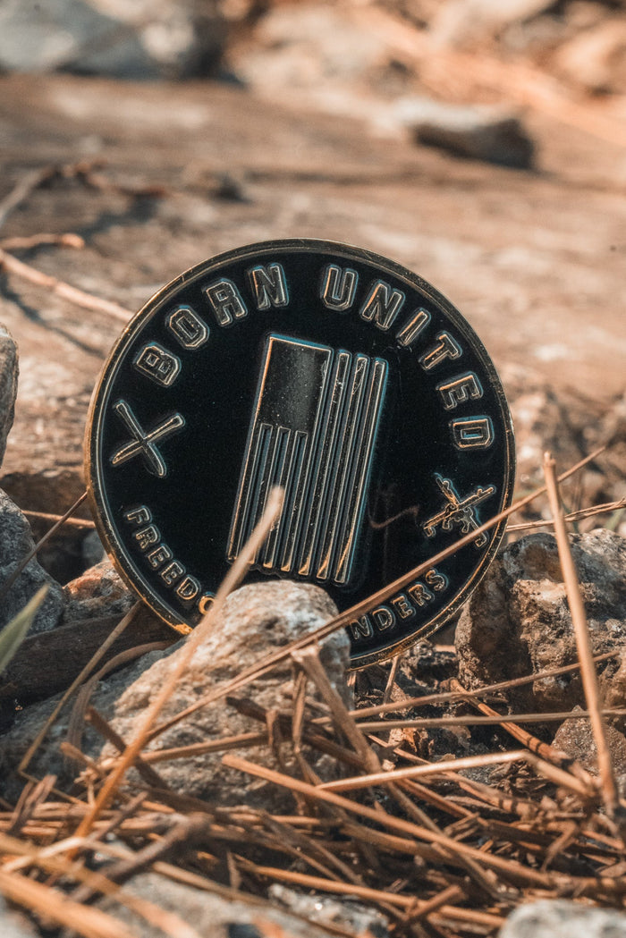 born united - logo pressed challenge coin