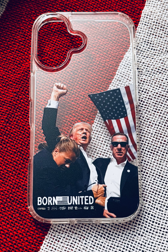 The Forever Legend iPhone Case by Born United Private Label features three figures with an American flag—one raising a fist, one bowing their head, one in sunglasses—with BORN UNITED boldly displayed at the bottom.