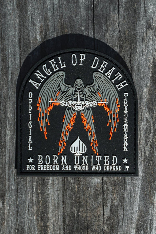 The Angel Of Death PVC Patch from Born United Private Label features a winged figure with flaming swords and the words Angel of Death and Born United for Freedom and Those Who Defend It, designed in black, white, and orange.