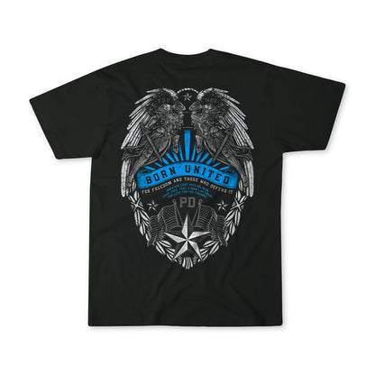 The "Back the Badge" black T-shirt by Born United Private Label features two eagles facing each other above a badge with blue accents, stars, leaves, and a "For freedom and those who defend it" banner.