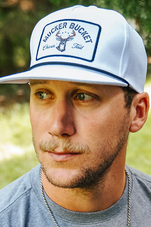 mucker bucket - chasin' tail bucket hat on model