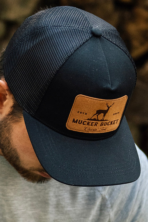 mucker bucket - chasin' tail bucket hat on model