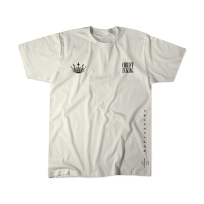 The Christ is King Premium Tee - Ivory by 13th features a bold black crown graphic, vertical “CHRIST IS KING” text, and standout “13TH” detail—a perfect statement shirt for believers.