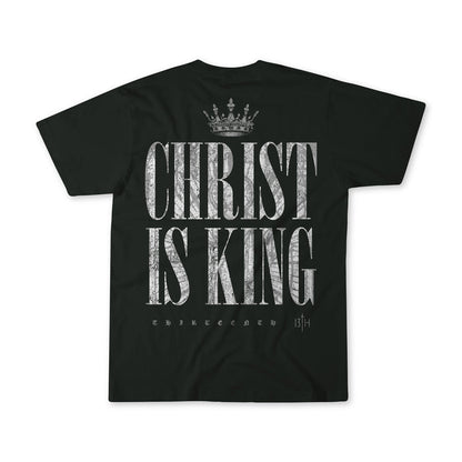 The Christ is King Premium Tee by 13th is a black shirt with a crown graphic above bold, distressed white “CHRIST IS KING” text. “THIRTEENTH” and “13TH” below honor faith in Christ the King.