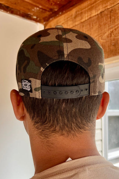 tango charlie - darkness is a hell of a coach camo snapback on model