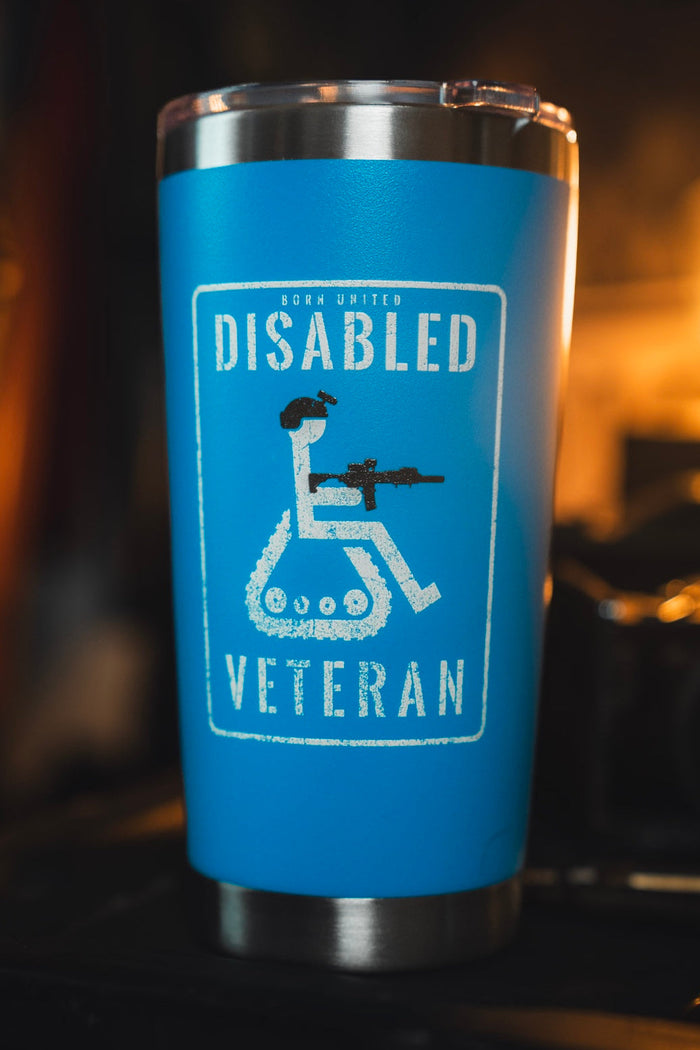 The Disabled Vet Tumbler - 20oz by Born United Private Label is a blue stainless steel tumbler showing a person in a wheelchair with a rifle and "Born United Disabled Veteran" text—a thoughtful veteran gift.