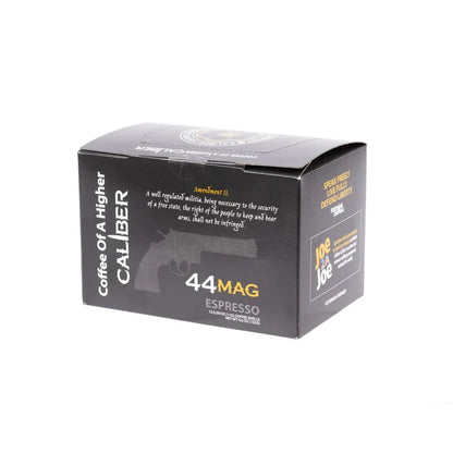 The predominantly black box with white text from Caliber Coffee Company highlights its Artisan Roasted beans with the tagline Coffee of a Higher Caliber. A quote on the right to keep and bear arms is featured on this box of Espresso Roast .44 Mag Single-Serve Shells.