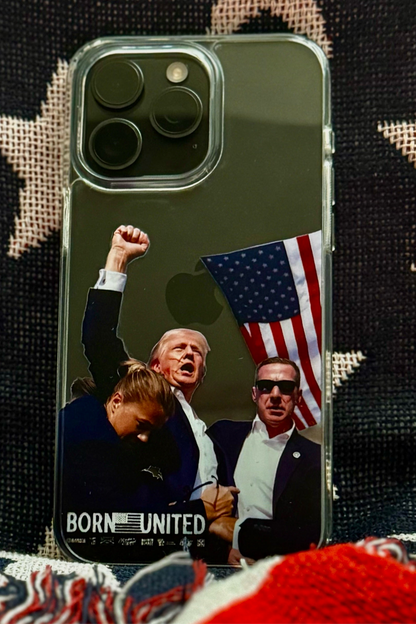 A Forever Legend iPhone Case by Born United Private Label sits on star-spangled fabric, featuring three people—one with a raised fist and U.S. flag—and the bold words BORN UNITED.