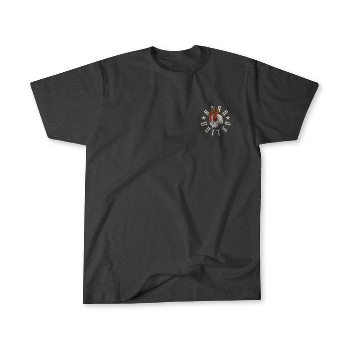 The "Let the Darkness" T-shirt by Born United Private Label is a dark gray tee with a small circular graphic—white text and a red-brown illustration—on the left chest, shown laid flat on a white background.