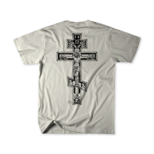 A light gray short-sleeve t-shirt shown from the back, featuring a large black and gray ornate cross graphic with religious illustrations.