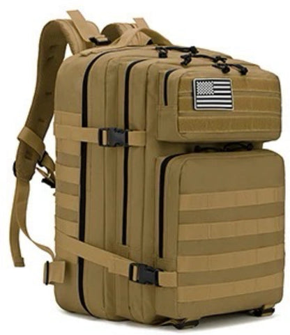 The Born United Private Label Standard Tac-Pac Ultimate Bundle is a tan tactical backpack with multiple compartments, adjustable straps, MOLLE webbing, and a black and white American flag patch—great for pairing with your favorite Born United T-shirt.