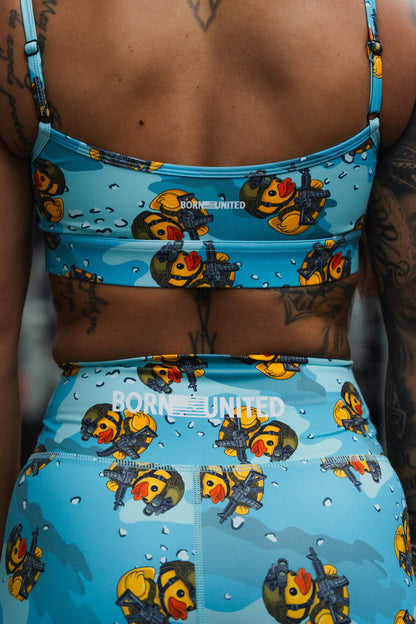 Close-up of a person’s back wearing the BORN UNITED Private Label TactiQuack Women’s High-Waisted Seamless Front Compression Training Shorts, featuring a playful cartoon duck soldier pattern for standout style and comfort.