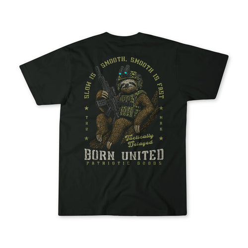 The "Tactically Delayed" tee by Born United Private Label features a sloth in tactical gear with a rifle and phrases like “Slow is smooth, smooth is fast” and “Tactically Delayed” printed around the graphic.