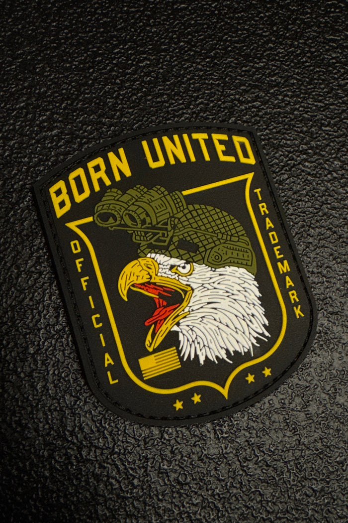 Eagle patch with text on a textured black background