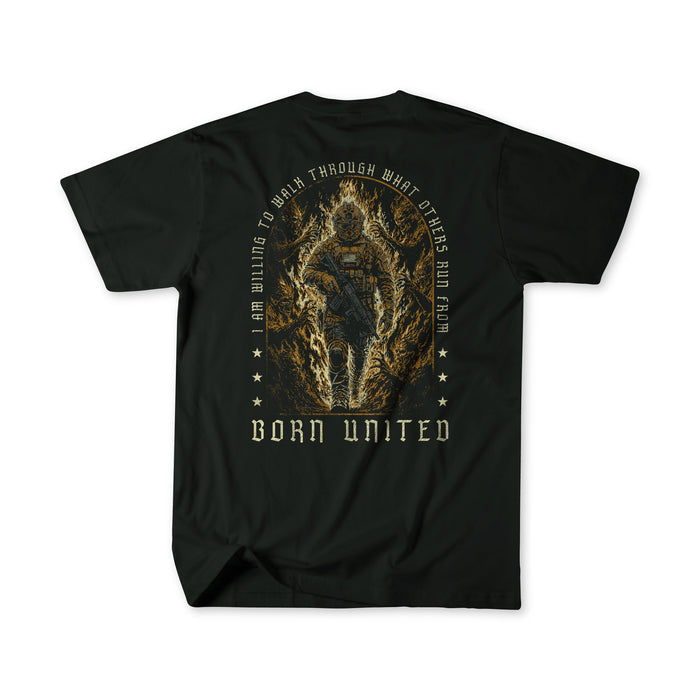 Introducing the Walking Through Fire tee from Born United Private Label—a premium black T-shirt featuring a striking graphic of a person walking through flames, surrounded by the powerful message: "I am willing to walk through what others run from," with "Born United" proudly displayed at the bottom. Crafted from top-quality fabric for enduring comfort, this resilience shirt is made for those who confront challenges head-on.