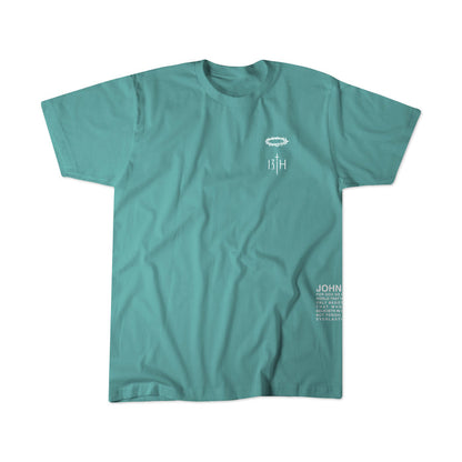 The Youth Jesus Saves Seafoam Tee by 13th features small white graphics and text with “13:1H” on the left chest and “JOHN” with more text on the lower right, making it the perfect Christian T-shirt for youth.